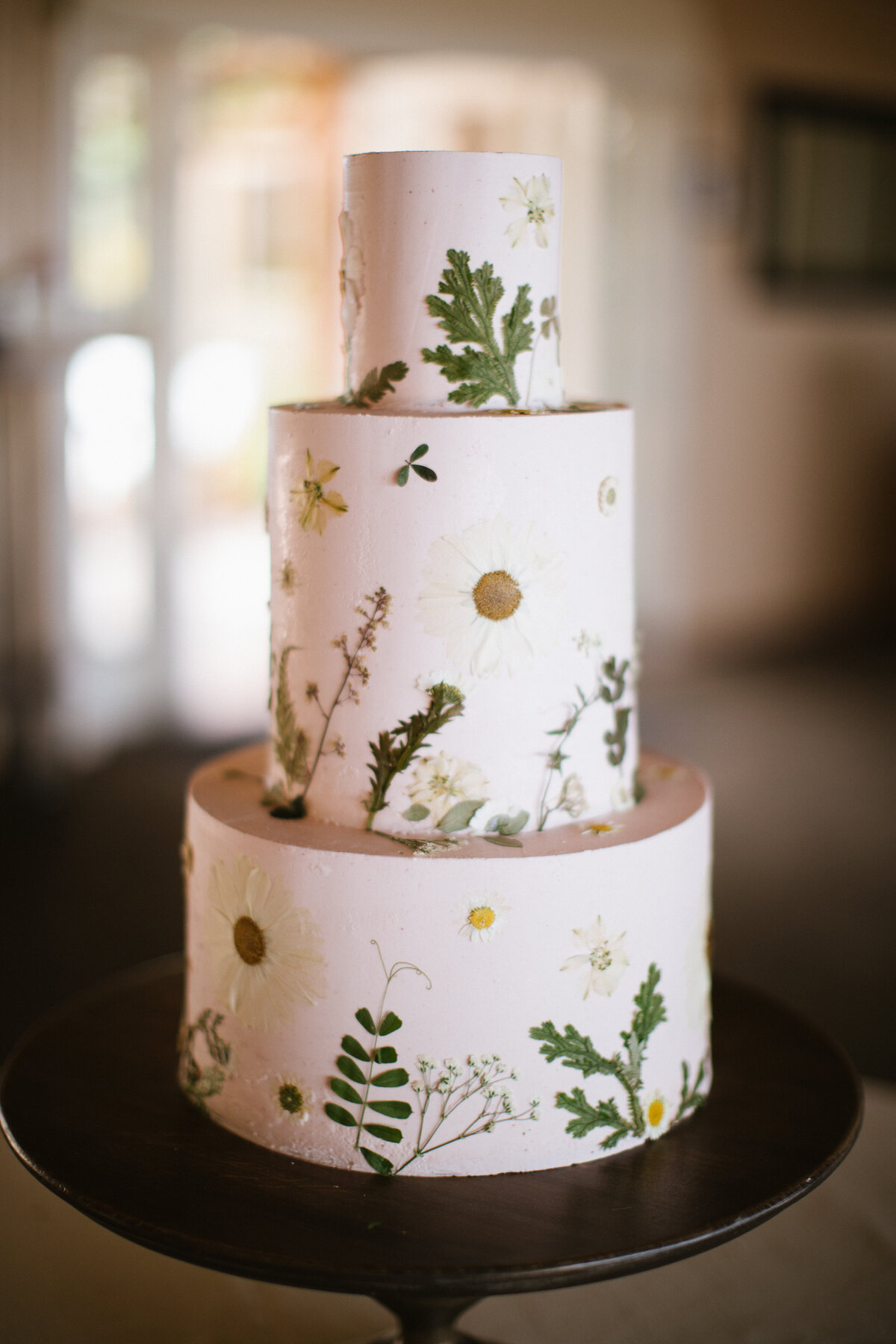 A wedding cake with leaves