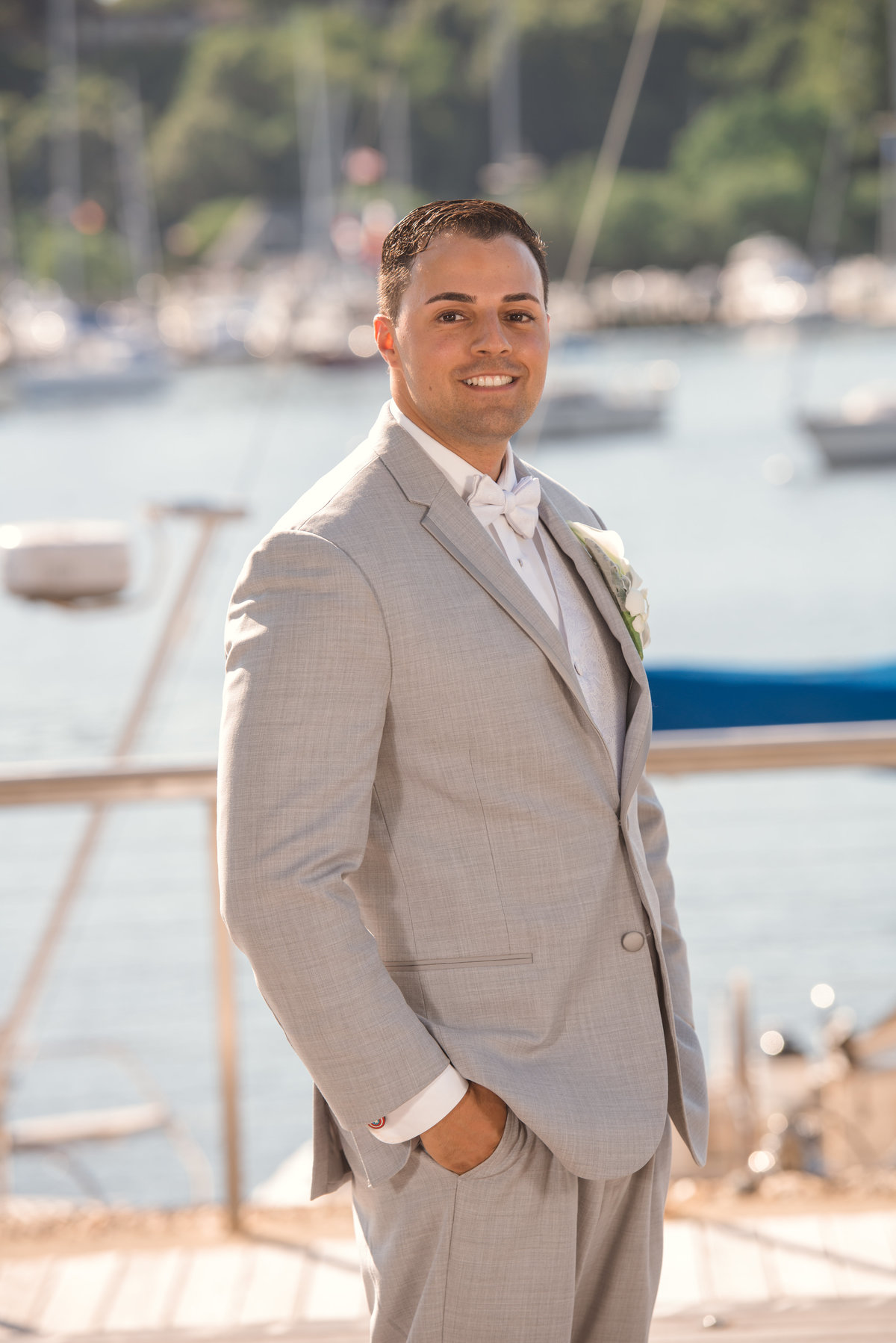 Groom at the docs of Harbor Club at Prime