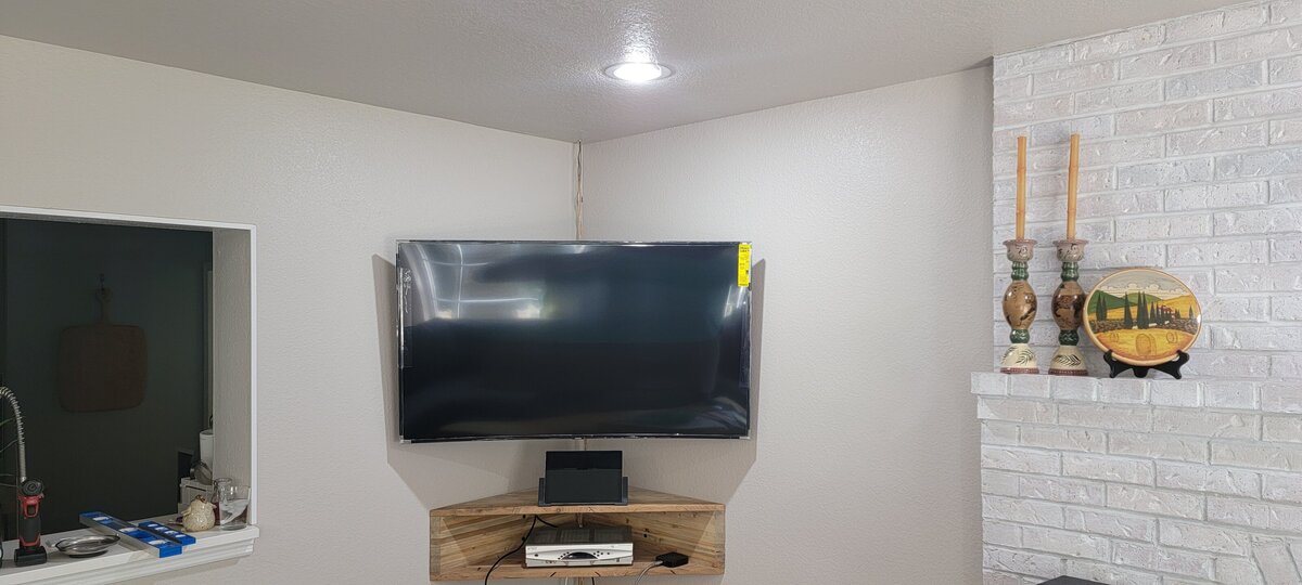 TV mounted in corner of room tampa fl
