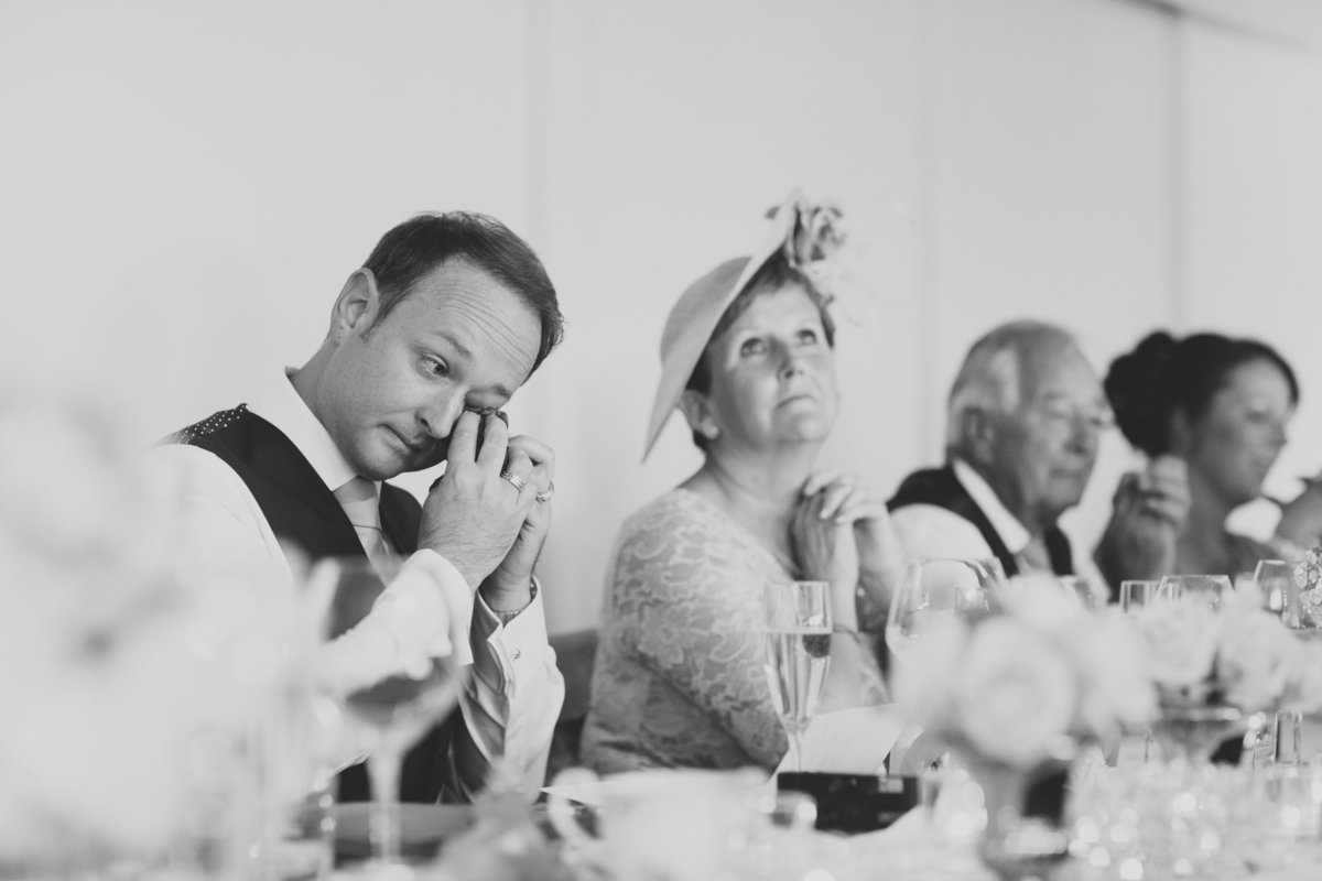 groom crying in speeches at wedding