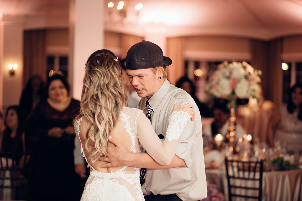 Wedding Photograph Of Man In White Long Sleeves Dancing With The Bride Los Angeles