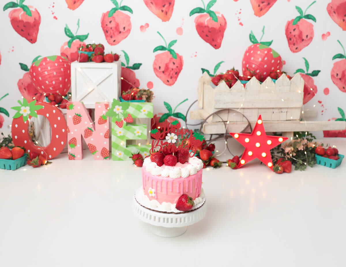 Strawberry cake smash setup in Rochester, NY.