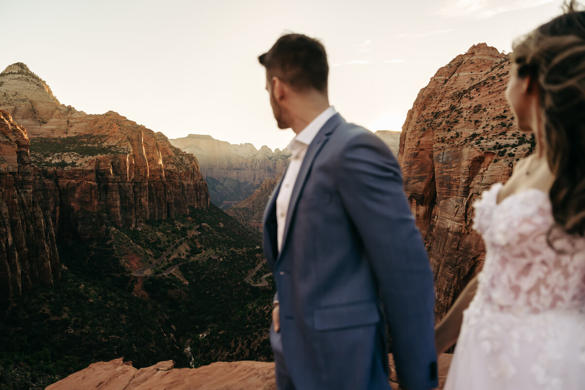 couple looking at mountain view during elopement