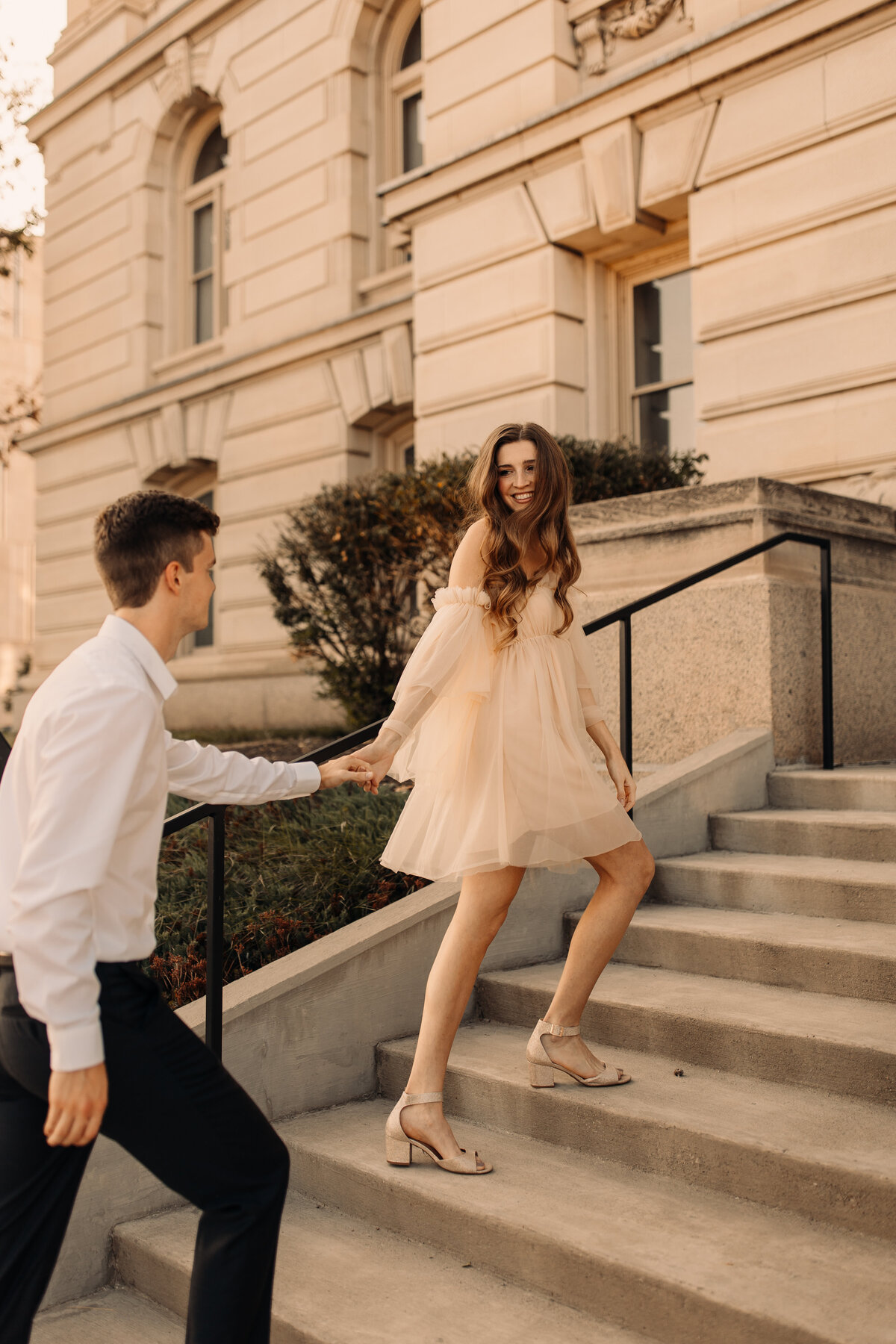 elegant and classy engagement photos in downtown Des Moines