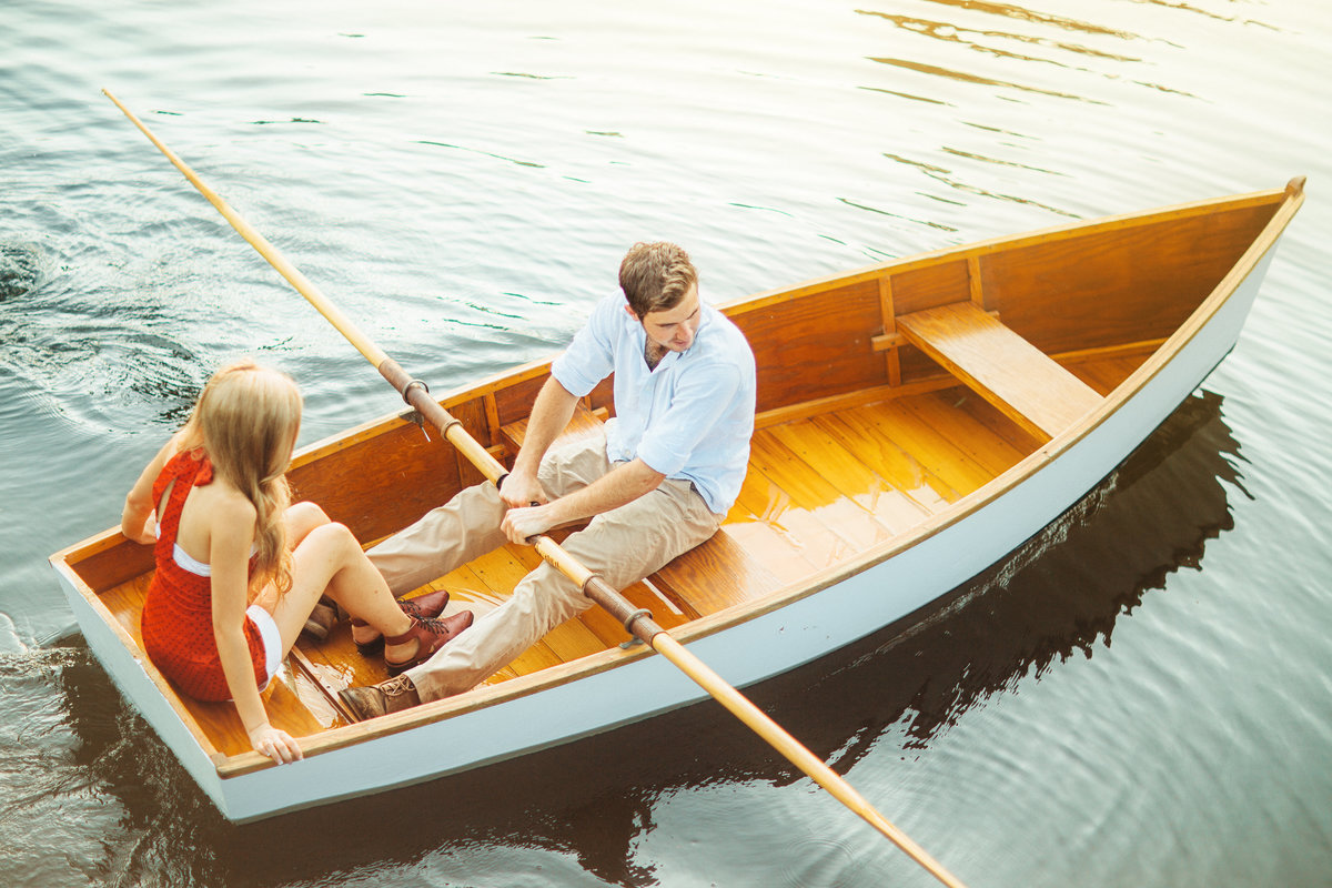 Engagement Photo of Couple On Rowboat