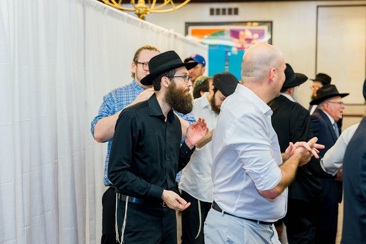 Eliana-Melmed-Photography-Chicago-LosAngeles-Jewish-WeddingPhotographer-CarmiKalman-MensDancing-00113