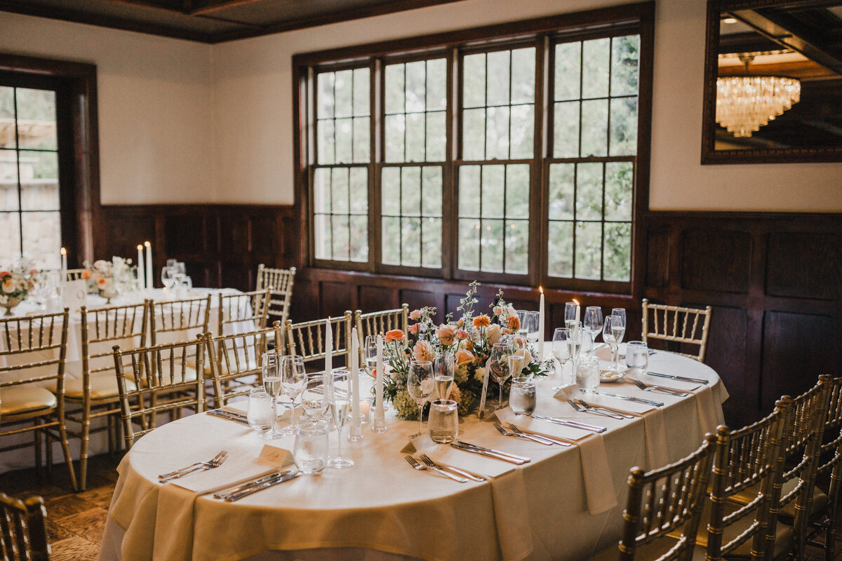 Elegant table set-up for a beautiful wedding with large windows