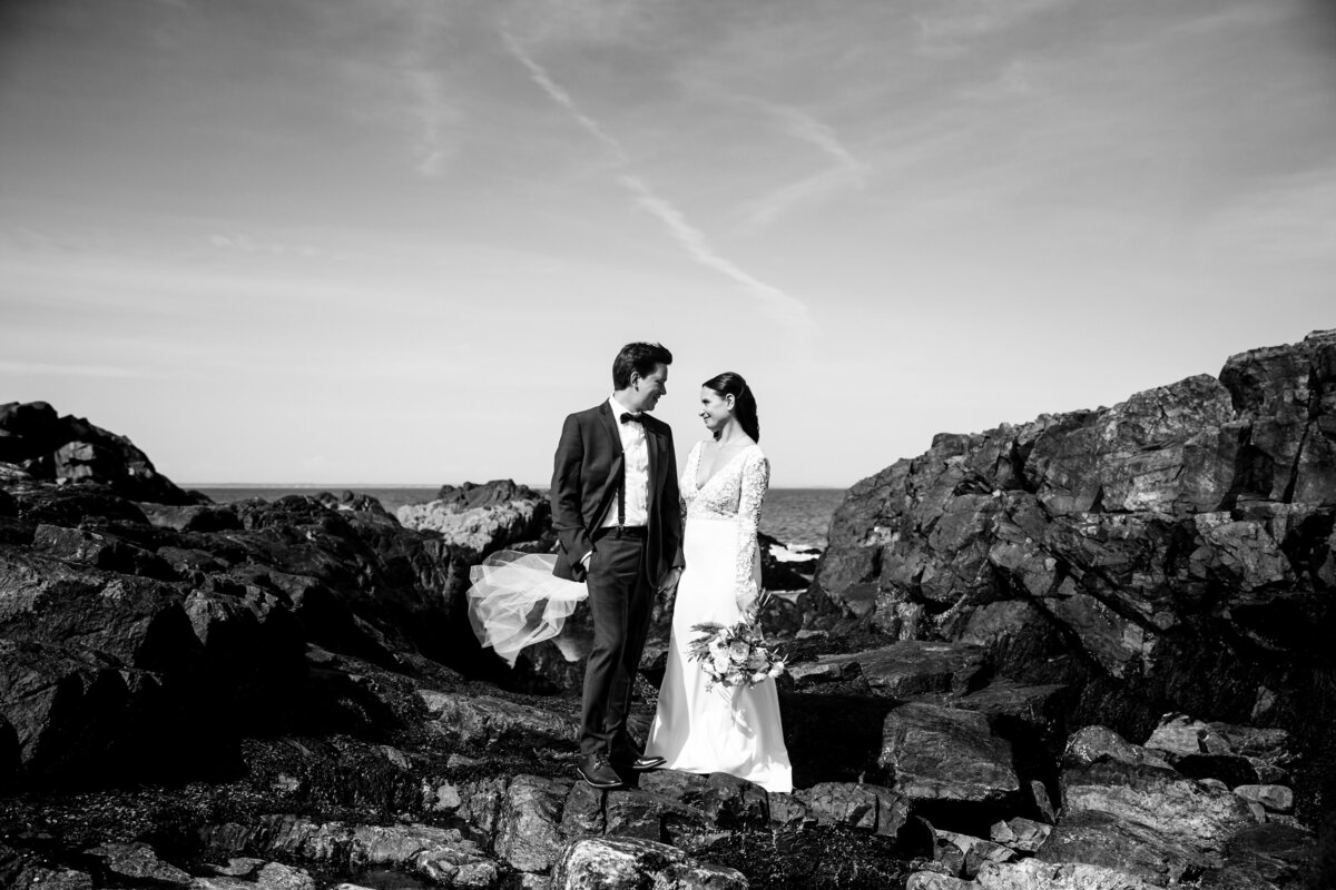 After eloping on Marginal Way Maine the couple holds one another