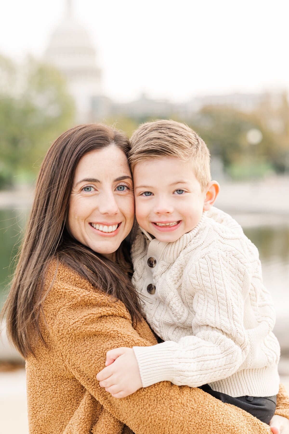 Mom and son smiling for Erin Thompson Photography at the US Capitol in Washington DC