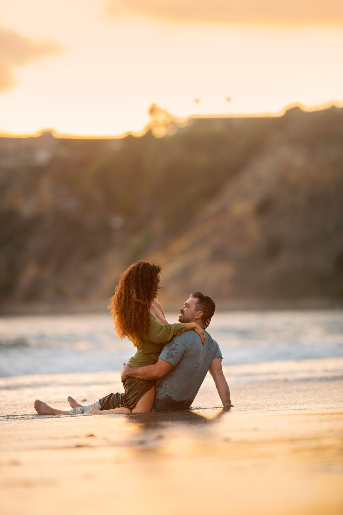 Sexy beach photoshoot of husband and wife in Palos Verdes pacific ocean in California