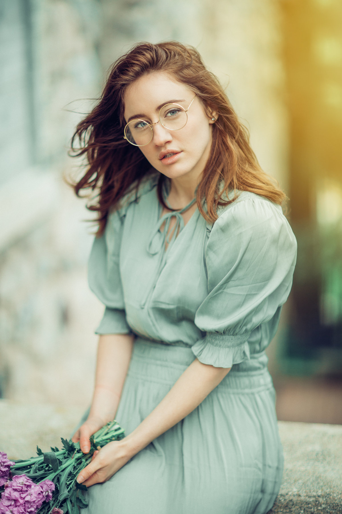 Portrait Photo Of Young Woman In Green Dress Wearing Eye Glasses Los Angeles