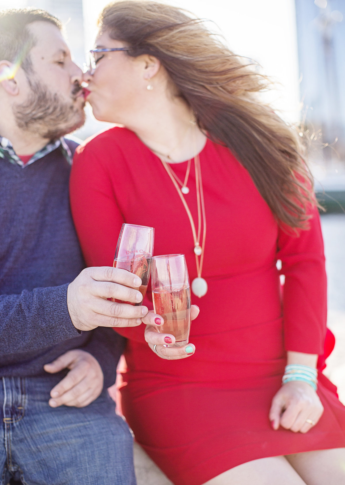 champagne toast engagement photos