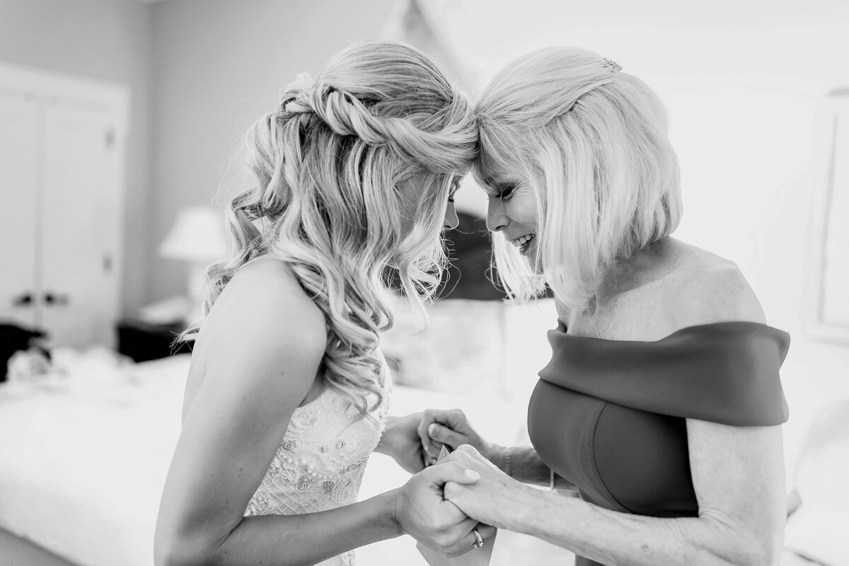 A Bride and Her Mom have a moment together at the Broadmoor