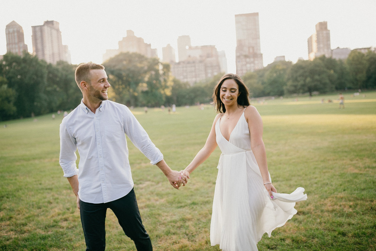 Engaged couple photographed in Central Park by Sweetwater.