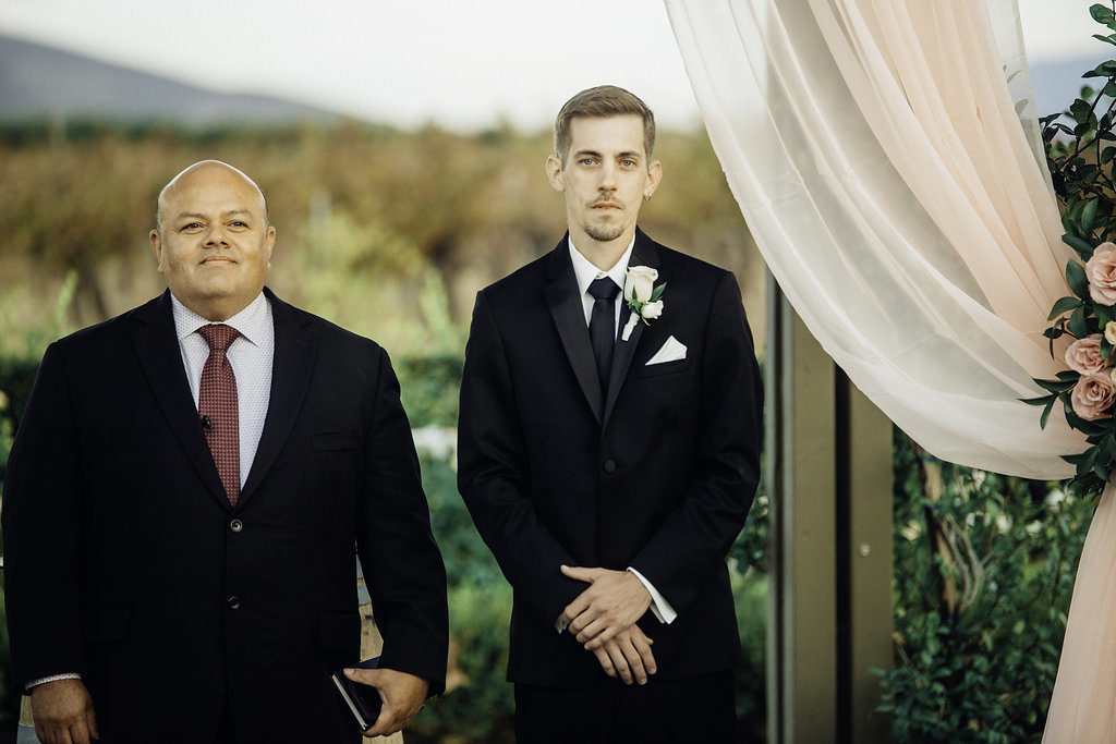 Wedding Photograph Of Two Men in Black Suit Standing And Waiting Los Angeles