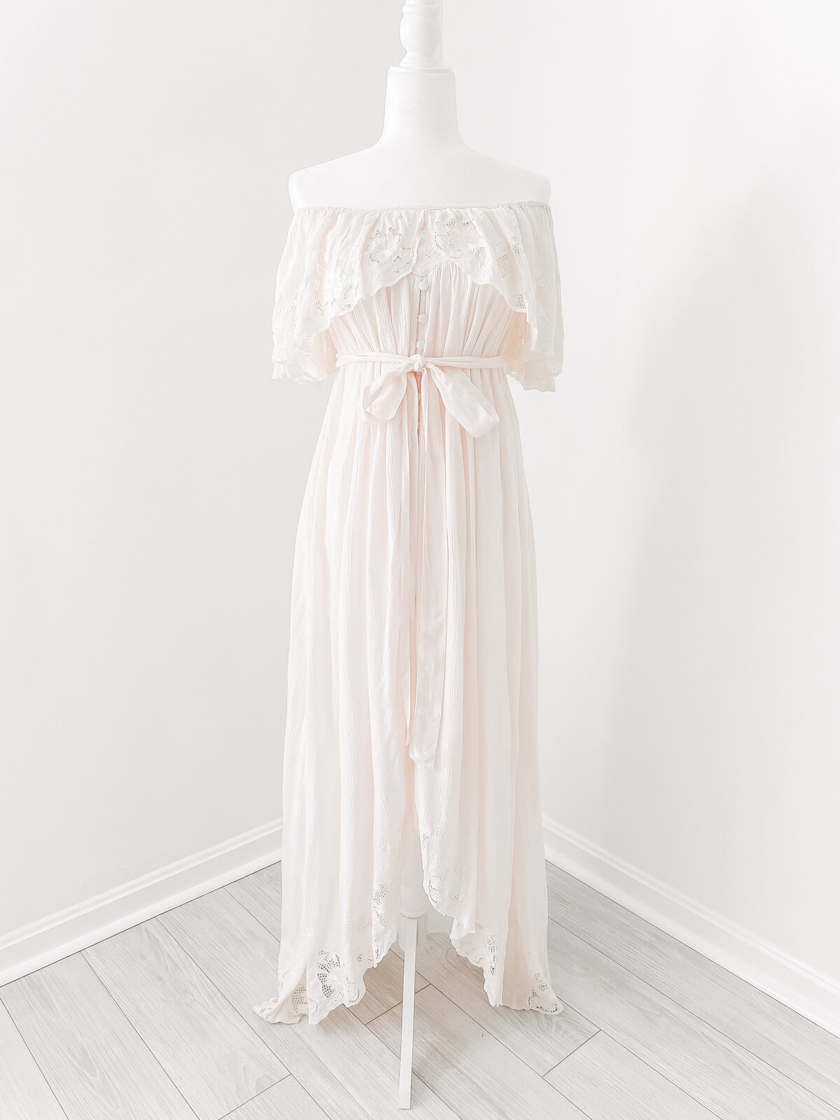 A flowy pink strapless dress with lace accents by DC Family Photographer