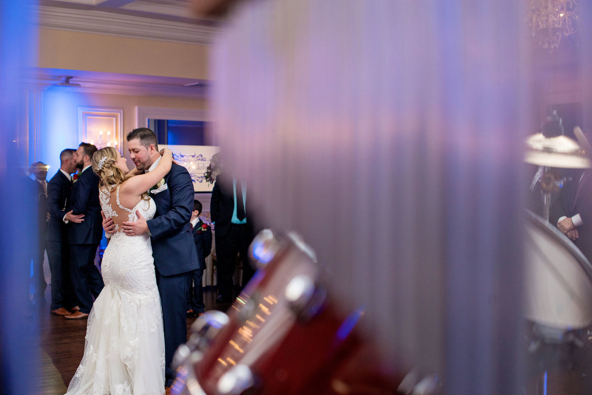 Bride and groom slow dancing at their wedding at Soundview Caterers