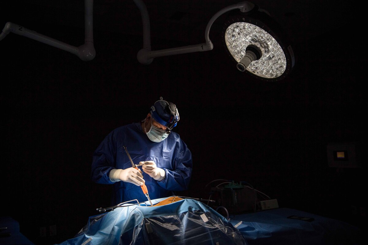 Marketing Image for Seaspine surgical tools with surgical light and tool in action