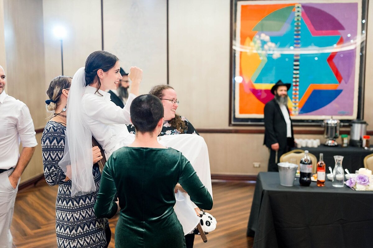 Eliana-Melmed-Photography-Chicago-LosAngeles-Jewish-WeddingPhotographer-CarmiKalman-WomensDancing-00132