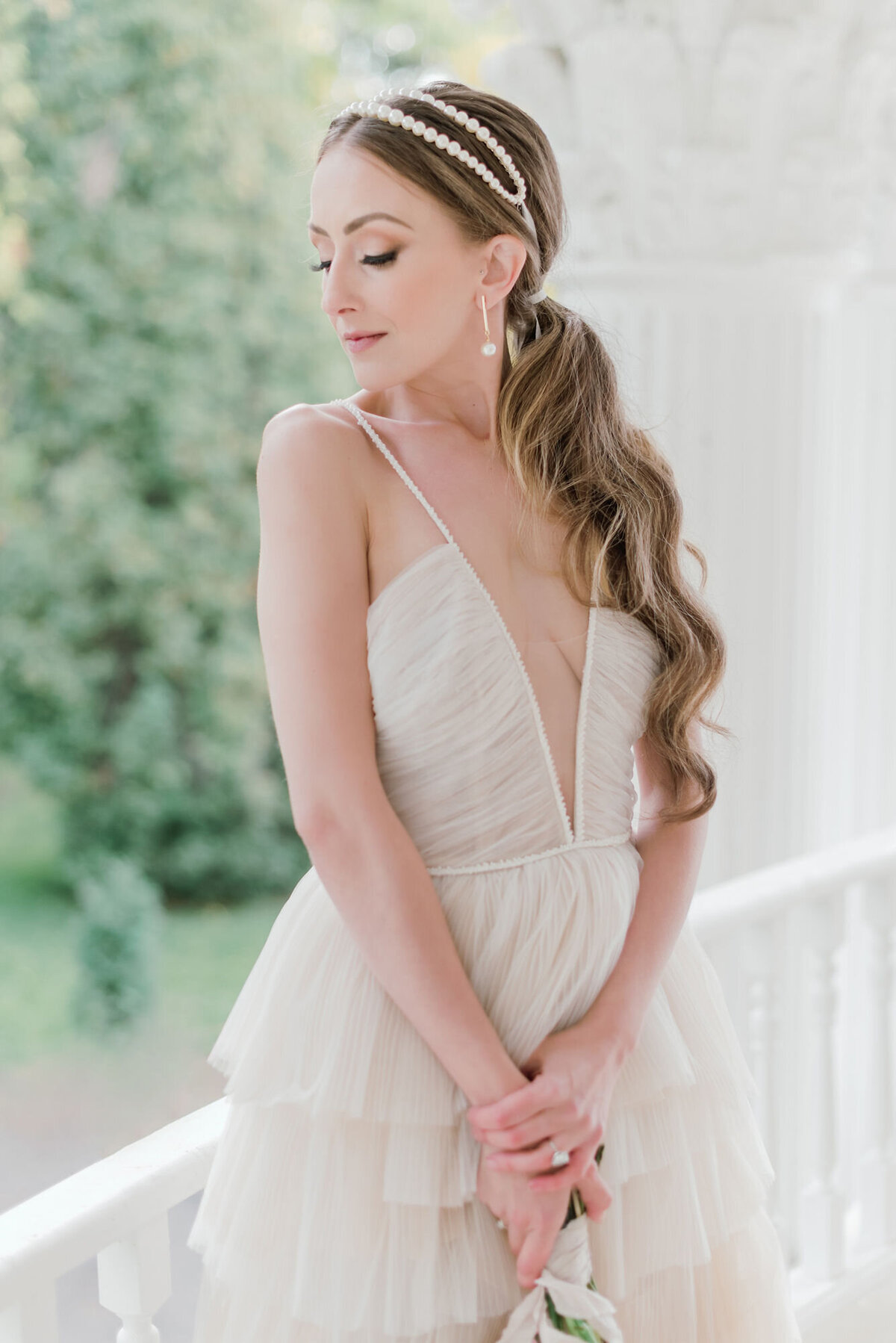 Stunning romantic bridal hair and makeup by Bellamore Beauty, feminine Calgary hair and makeup artist, featured on the Brontë Bride Vendor Guide.