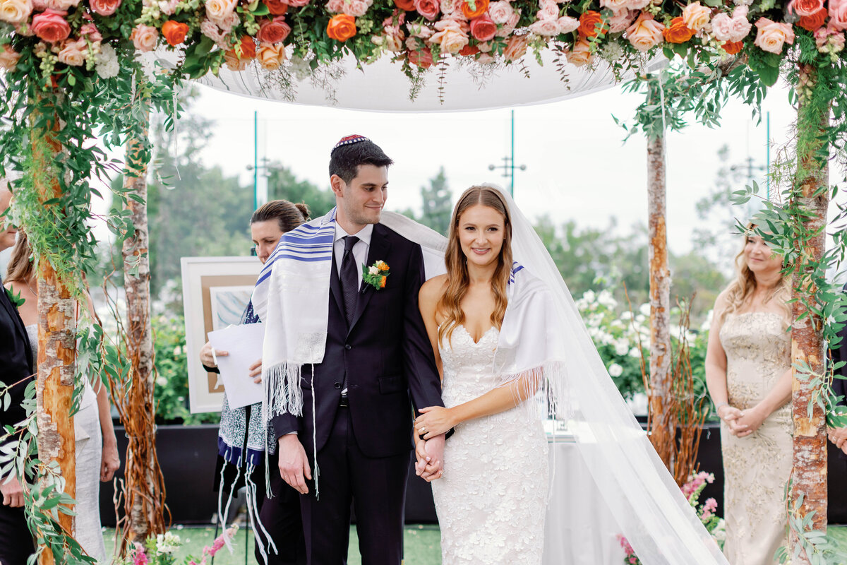 bride-and-groom-under-chuppah-at-the-london-west-hollywood