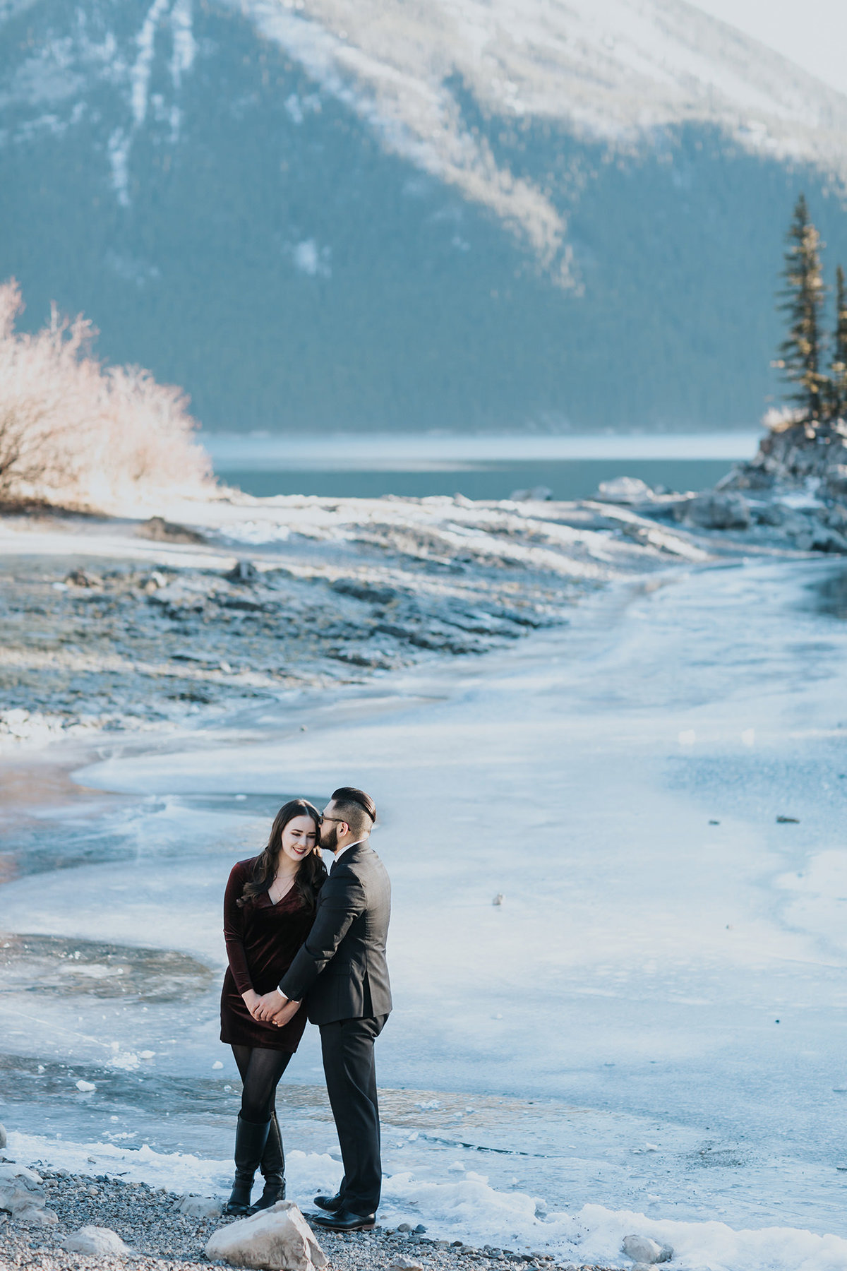 icy blue lake minnewanks winter engagement photography session couples photos