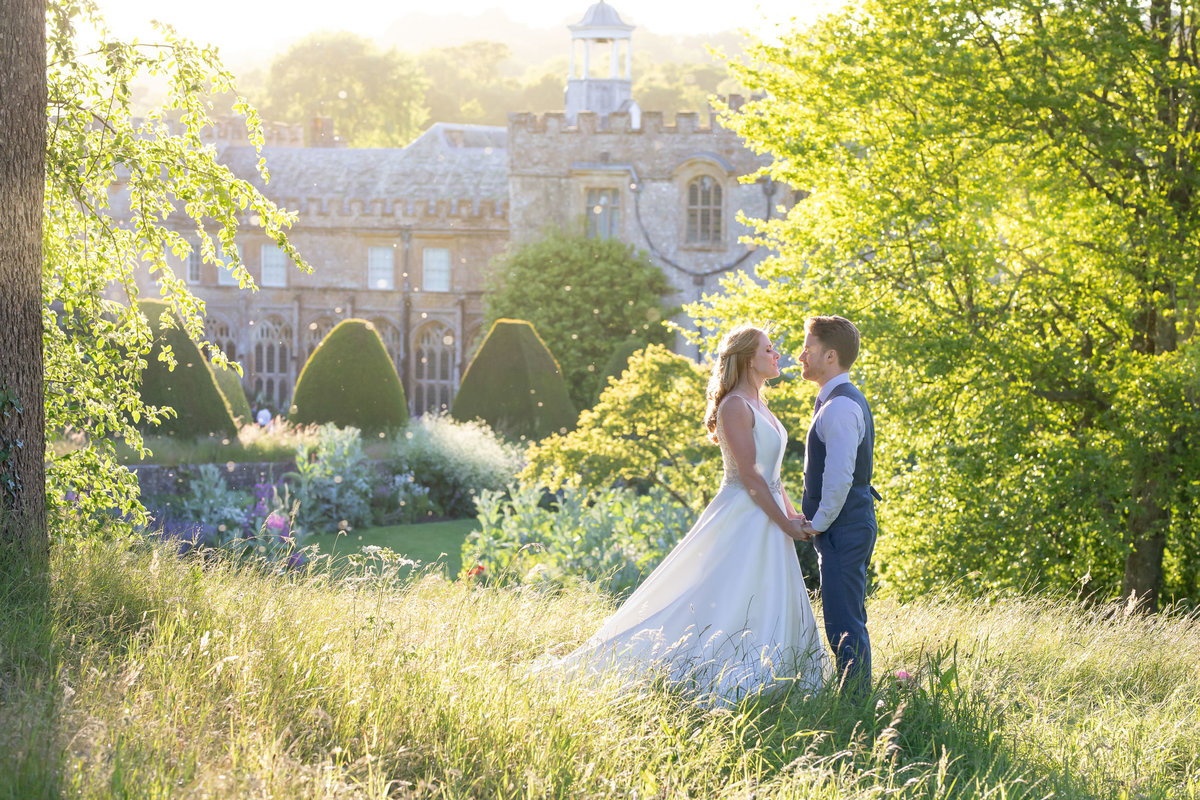 Bride and Groom in Evening light wedding photos at Forde House Wedding in Somerset_