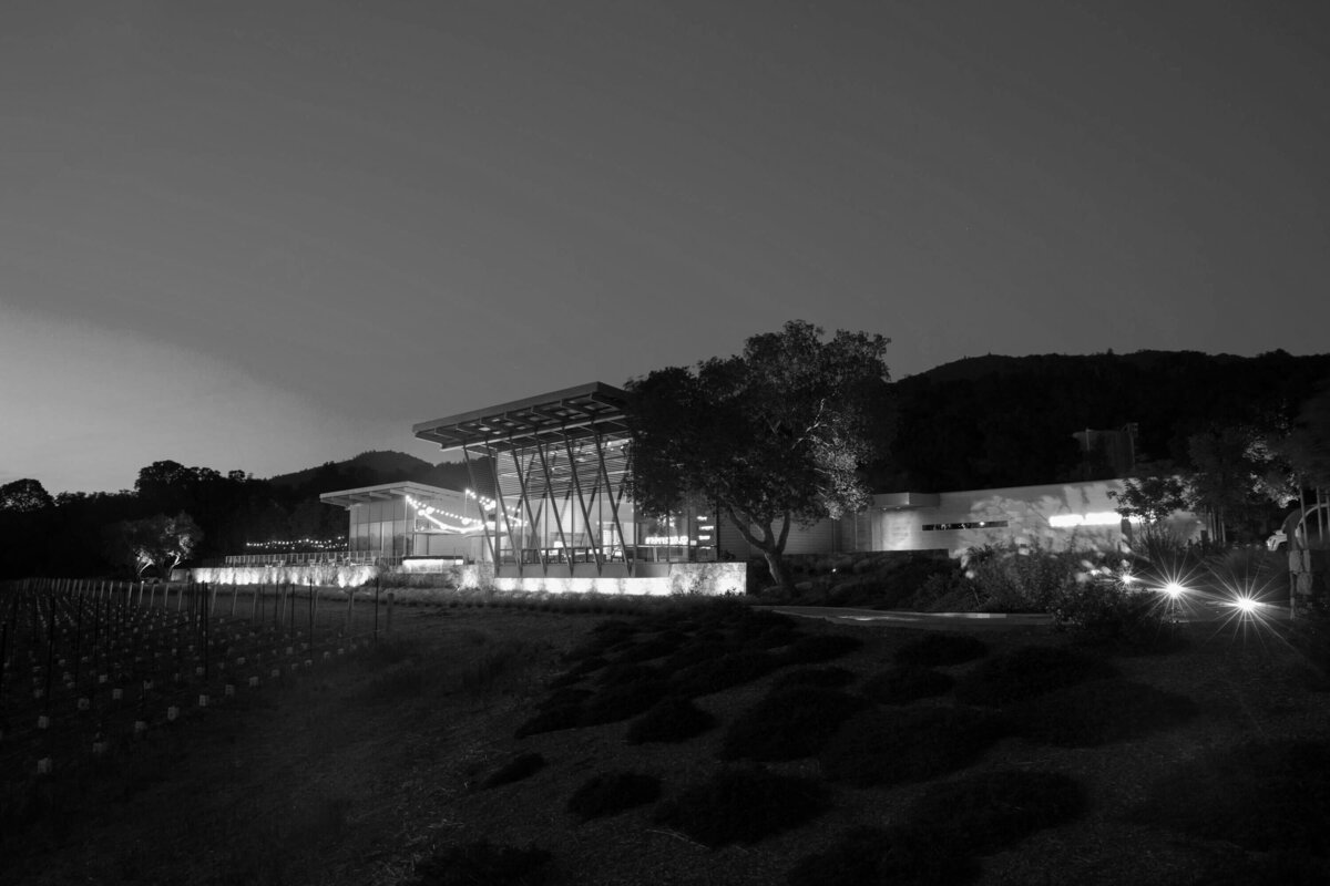Wide view of an illuminated resort in an otherwise-dark night.