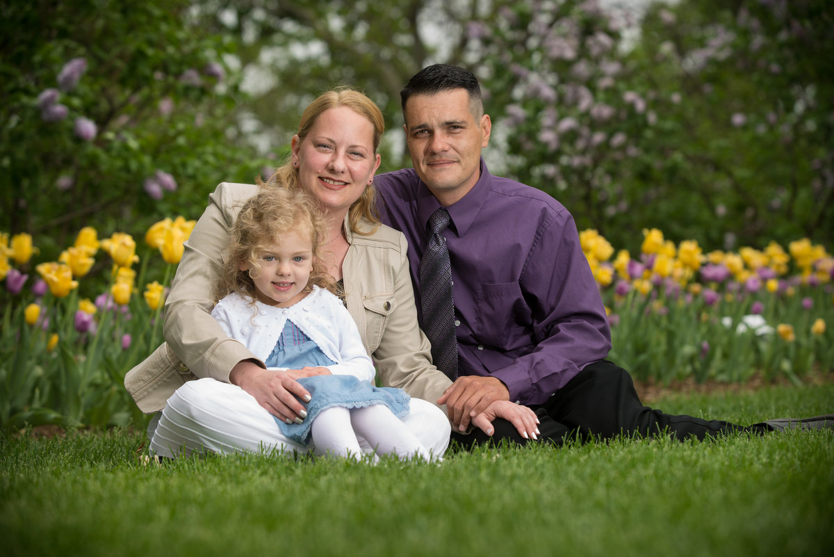 Family portrait with tulip background in Lilacia park in Lombard