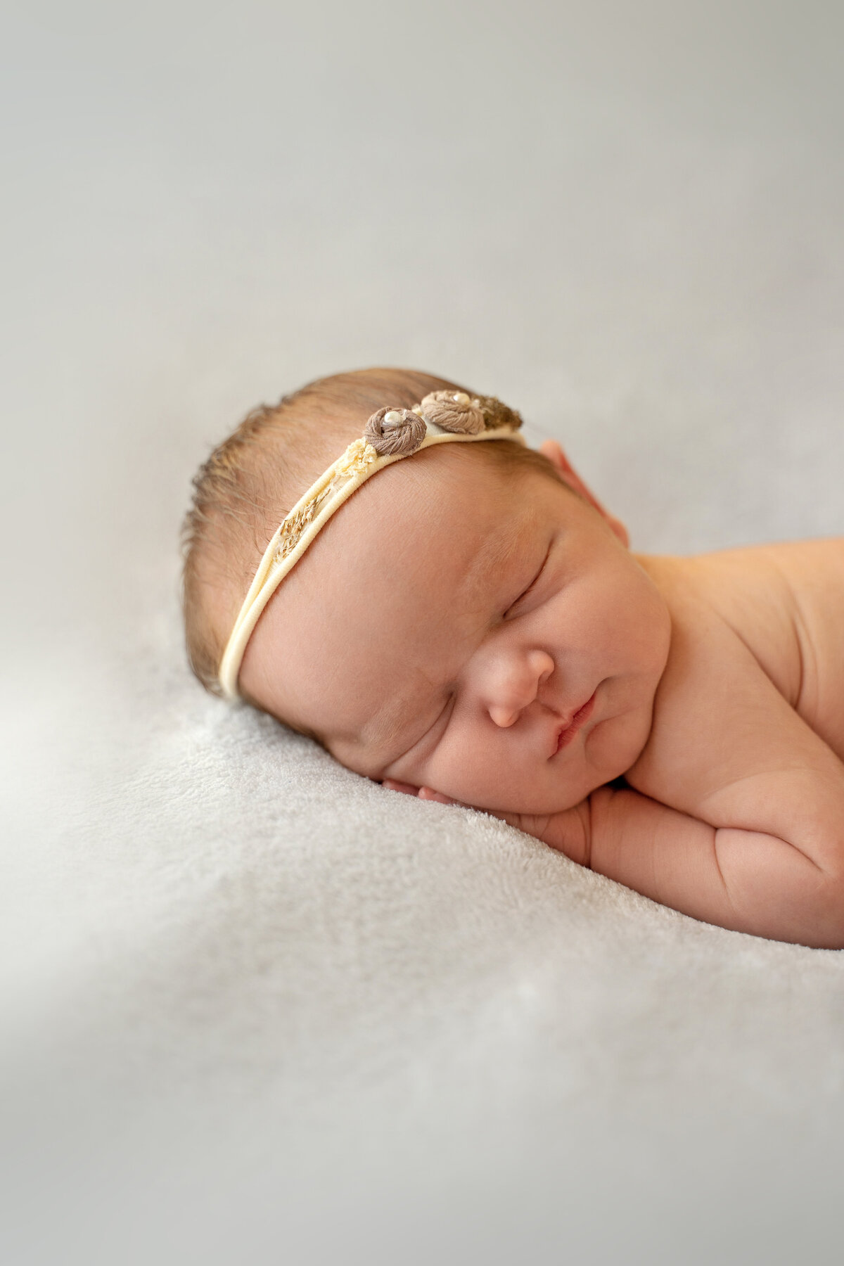 newborn-baby-with-yellow-handband