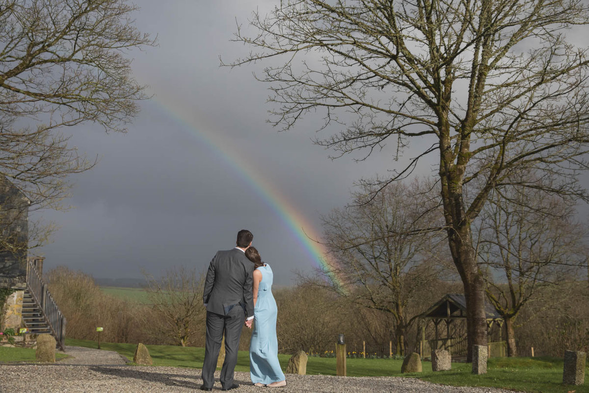 Rainbow over The Green with wedding couple elopement at The Green Cornwall