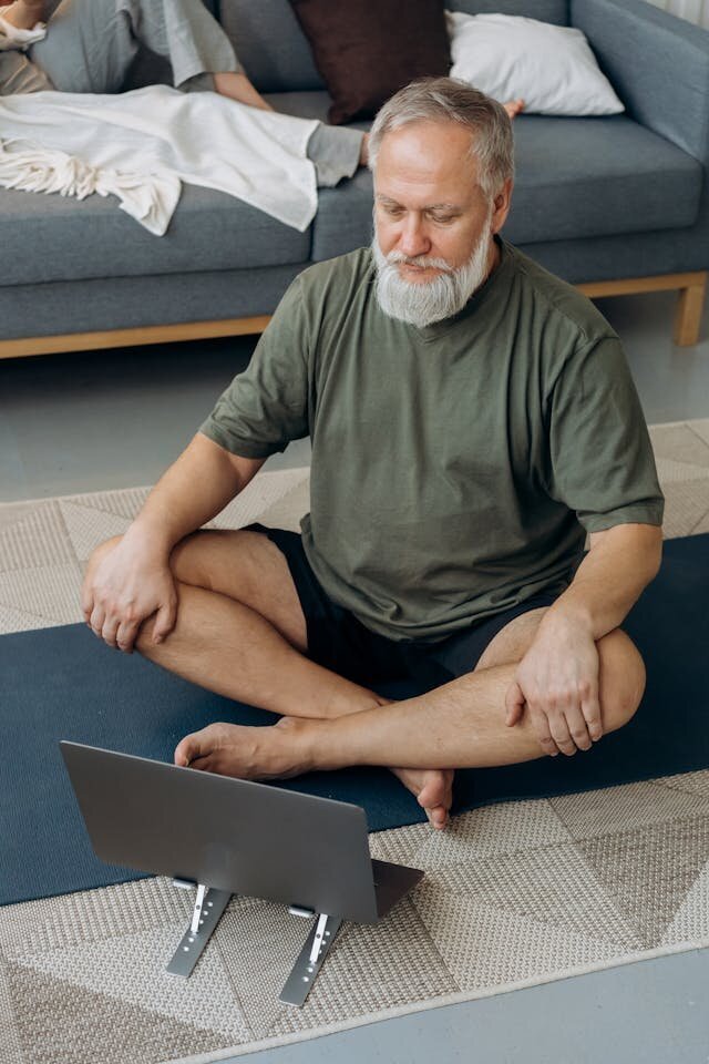 man yoga  laptop