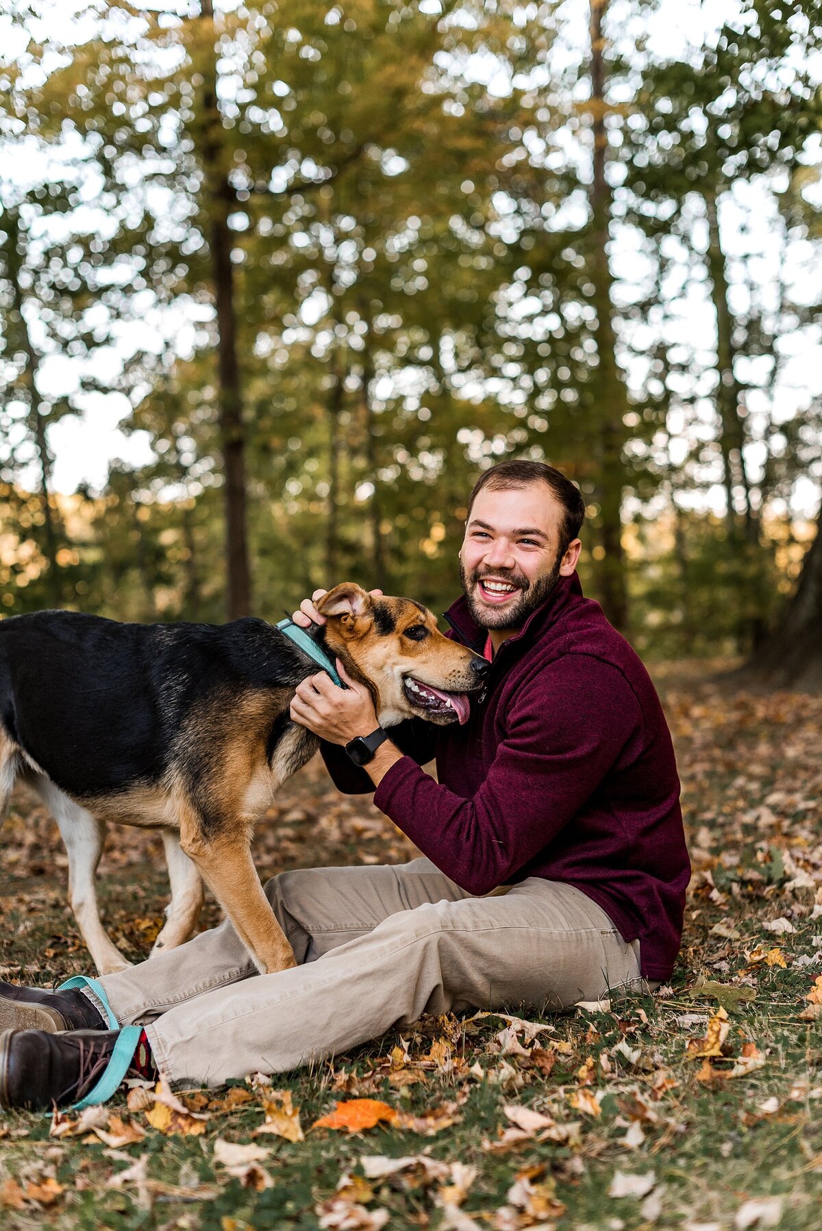 guy with his dog in woods