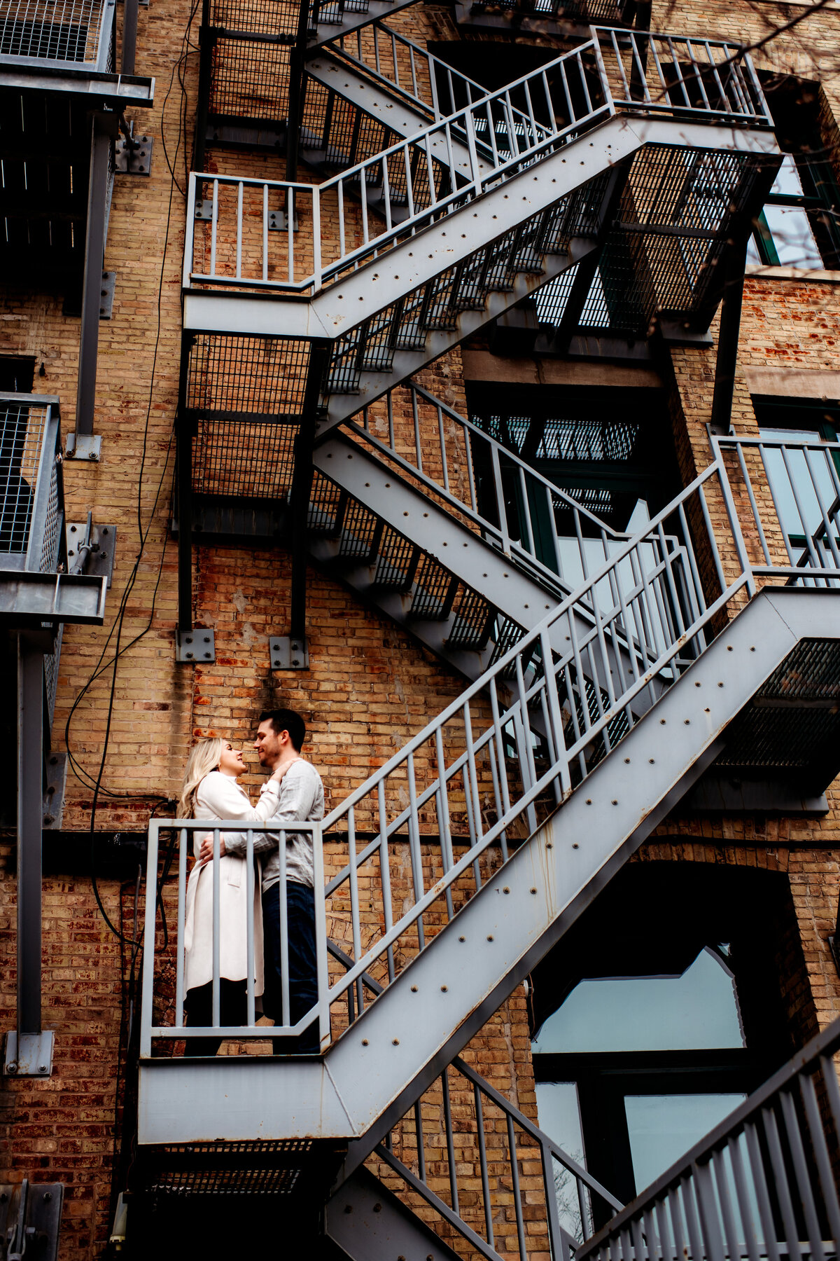 Man and woman on fire escape