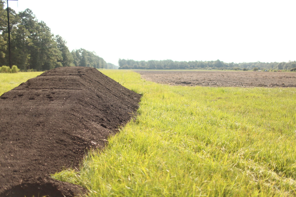 60 yards of Farmer D compost about to spread on the farm at Longleaf Preserve 2010