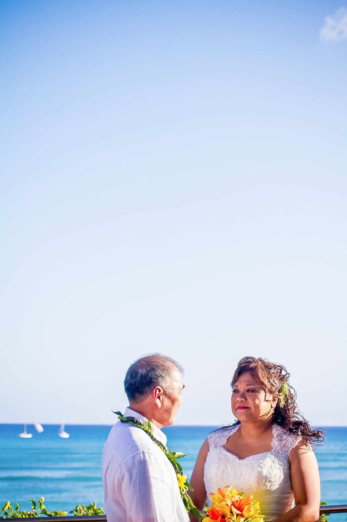 A Bride and Groom Get Married by the Beach