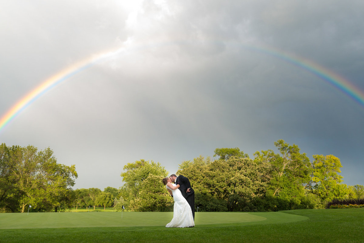 Rainbow on a wedding day during golden hour time