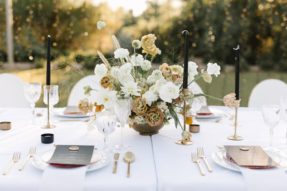 tablescape with gold and black accents