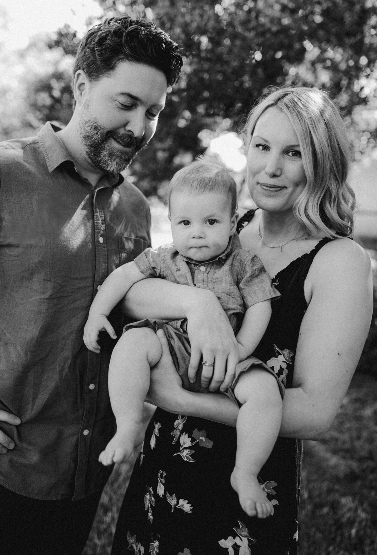 Mother and father holding child at Austin family photo session