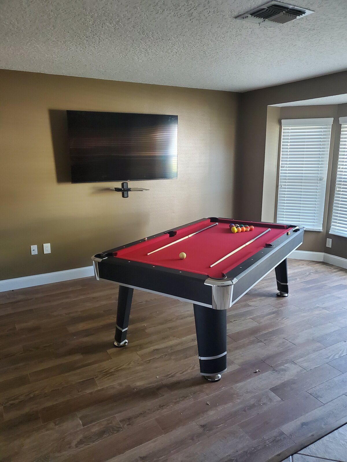 Mounted TV Service over Pool Table in Dunedin fl