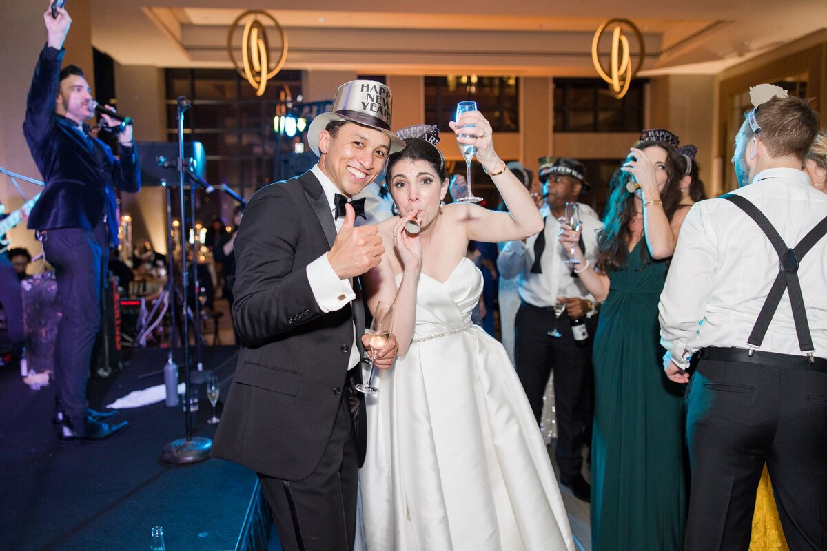 Event-Planning-DC-wedding-Intercontinental-Wharf-New-Years-Eve-Kristen-Gardner-Photography-party-hat-blower