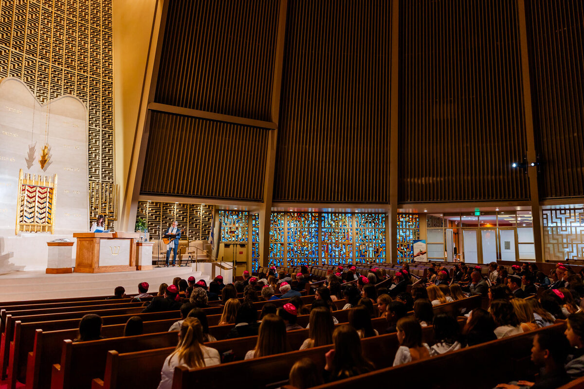 A view from the congregation of a bat mitzvah in a temple taken by a Bellevue Bar and Bat Mitzvah Photography professional