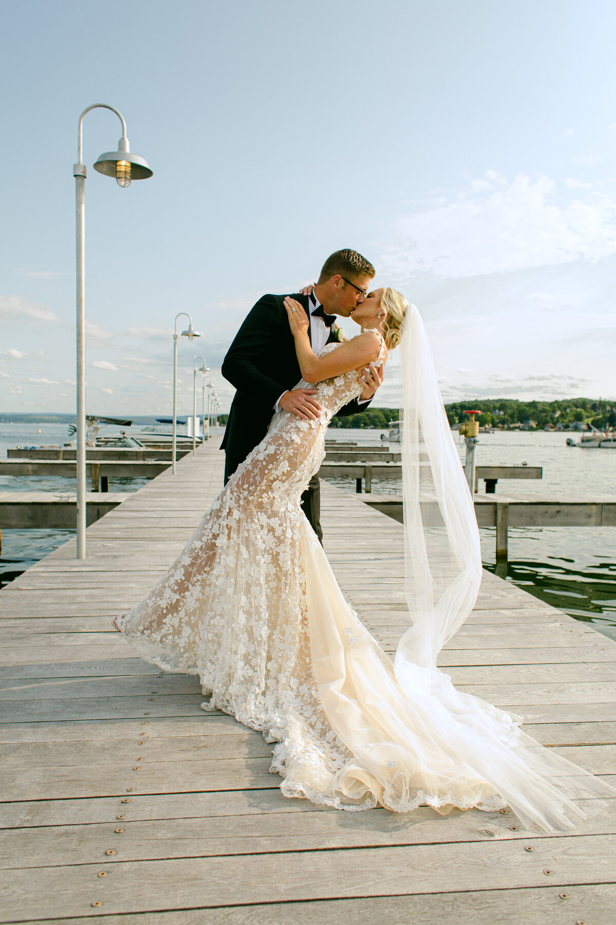 The Lake House on Canandaigua Wedding_Bride and Groom on Dock Photos_Verve Event Co (1)