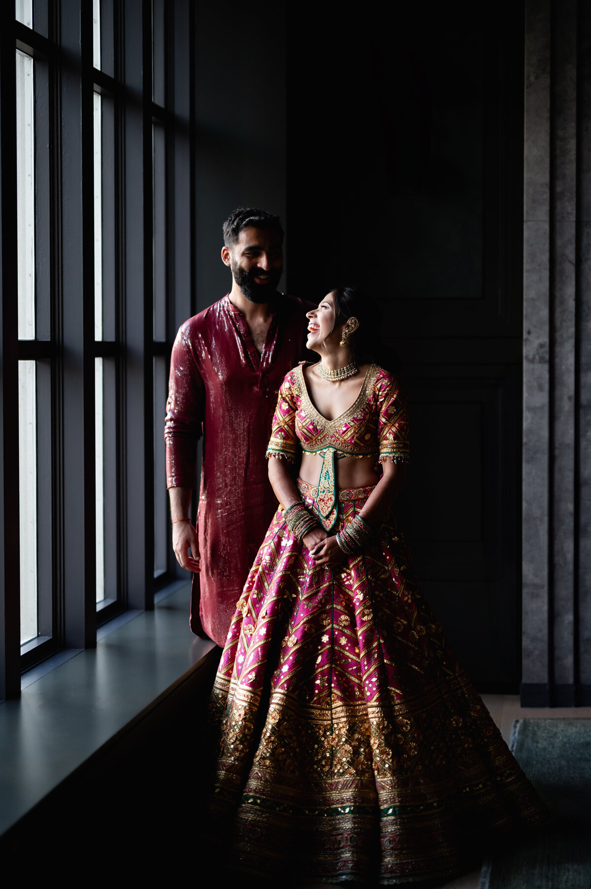 Indian couple by window light