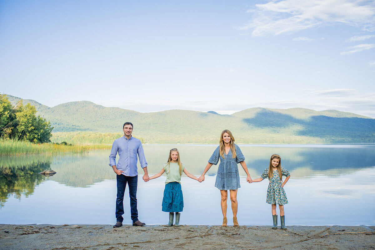 family holding hands chittenden reservoir mountain top inn