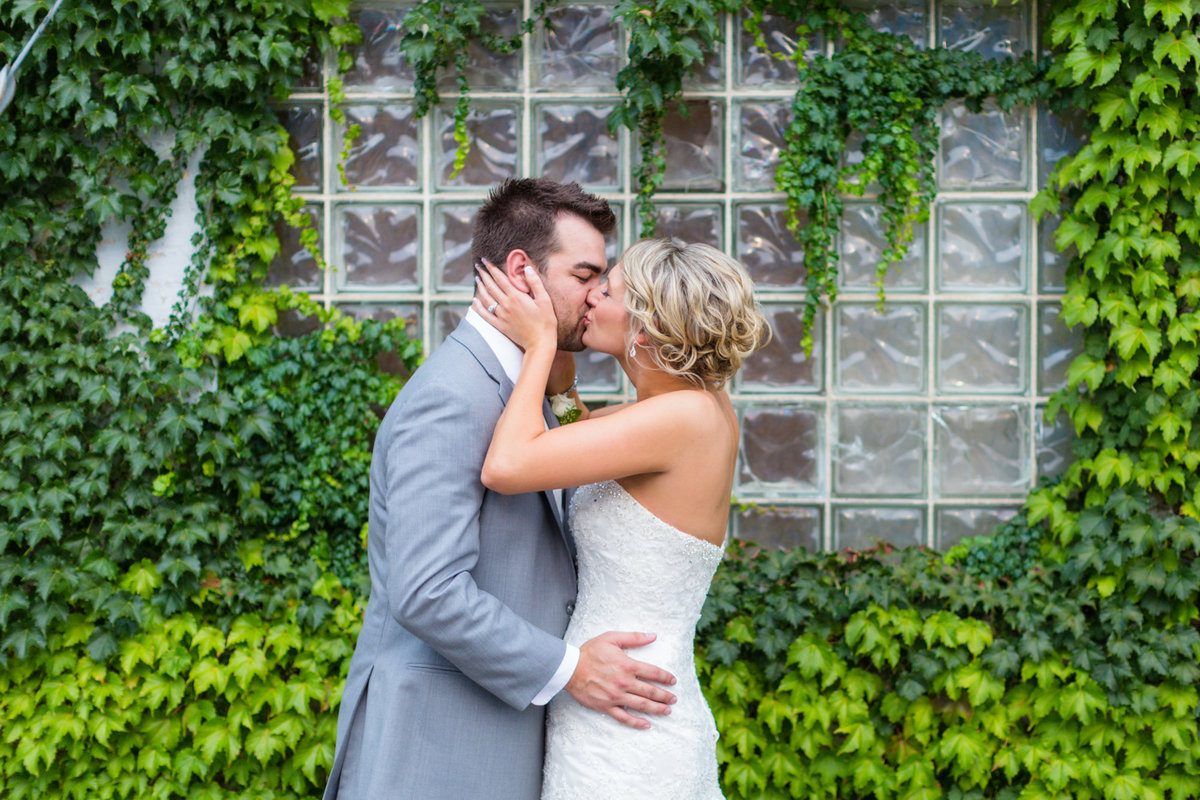 Bride & Groom with ivy on their wedding day in Rochester minnesota