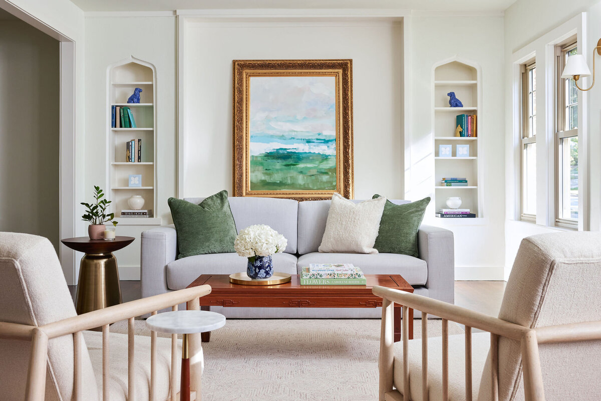 cocoloba homes cockrell ave living room with gold framed picture on wall