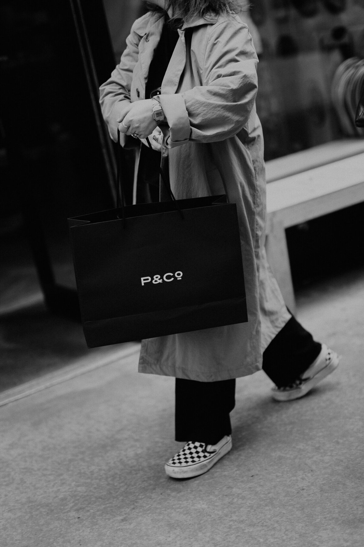 Customer carrying a P&Co Bag from their pop up store in Shoreditch.