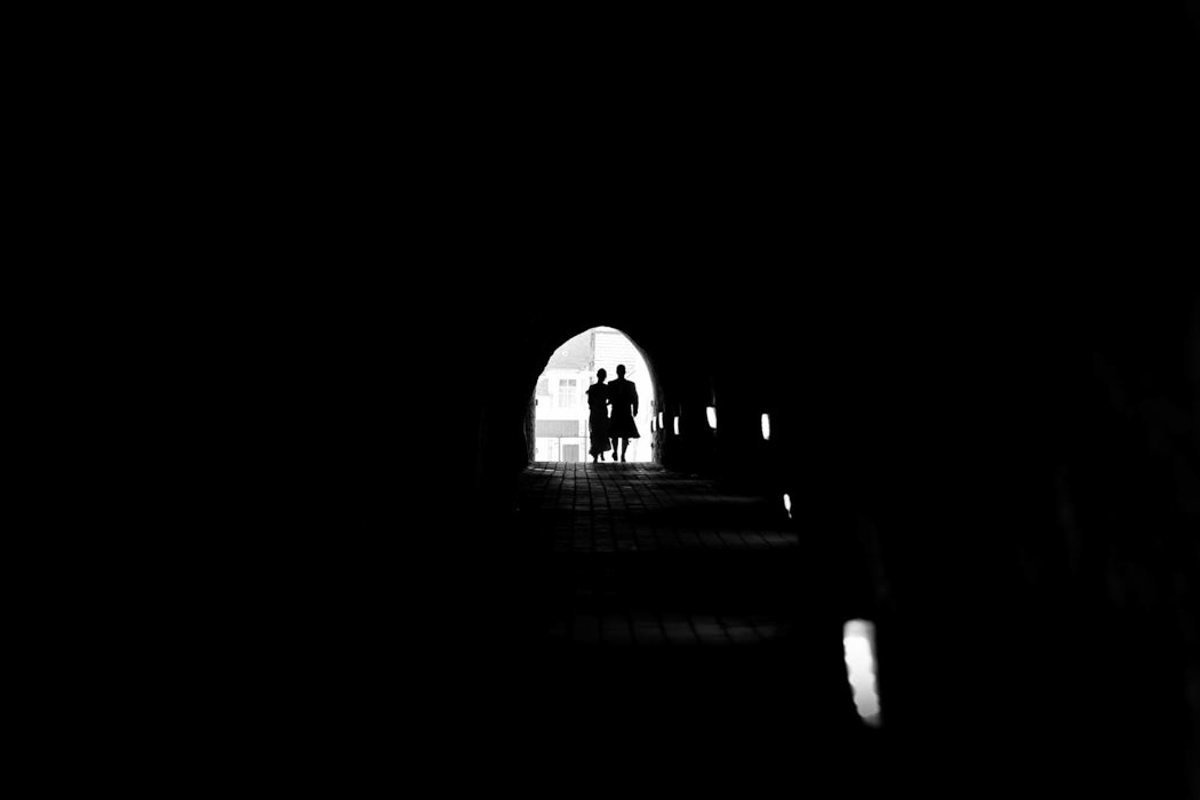 Couple in the Tunnels at Tunnels Beaches Devon