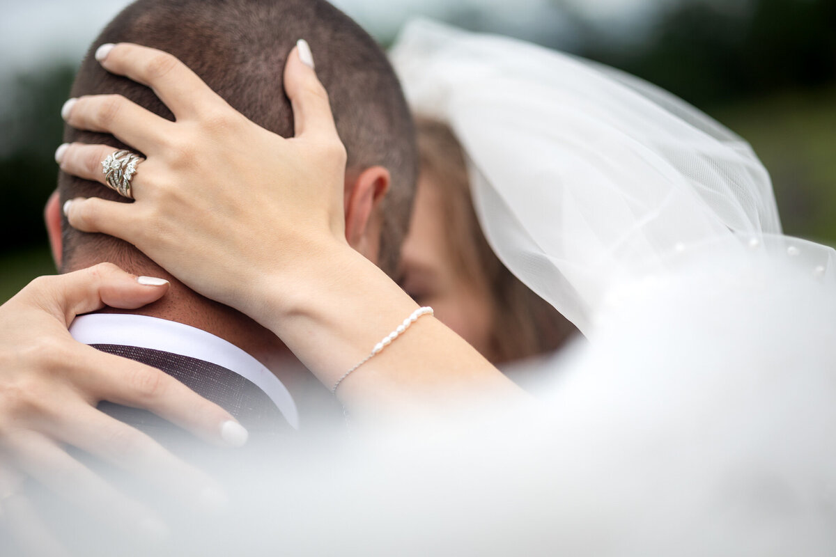 Couple doing a Veil shot wedding photo at a venue in Jacksonville, Florida